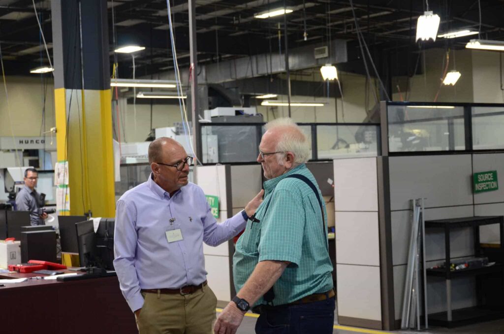 Scott President of Savage with Staff