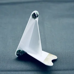 white-machined-metal-part